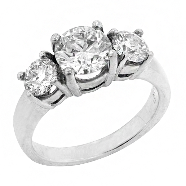 Round Three Stone Diamond Engagement Ring in Platinum