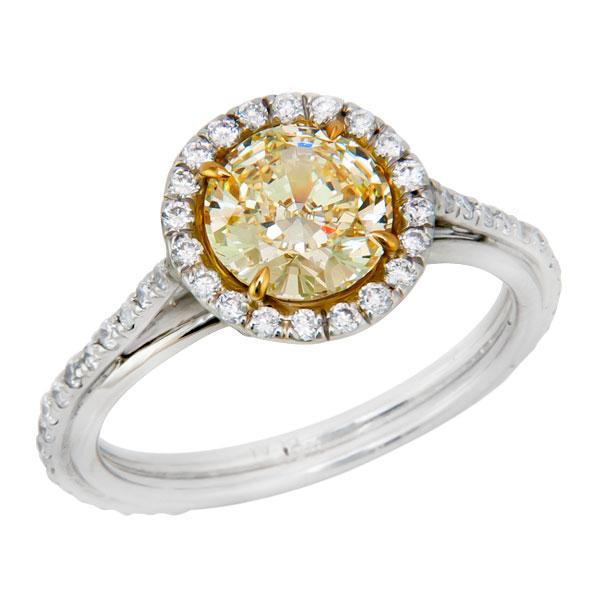 View Halo Style Round Shape Natural Fancy Yellow and White Diamond Ring Set in Platinum